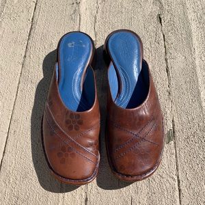Brown leather slippers